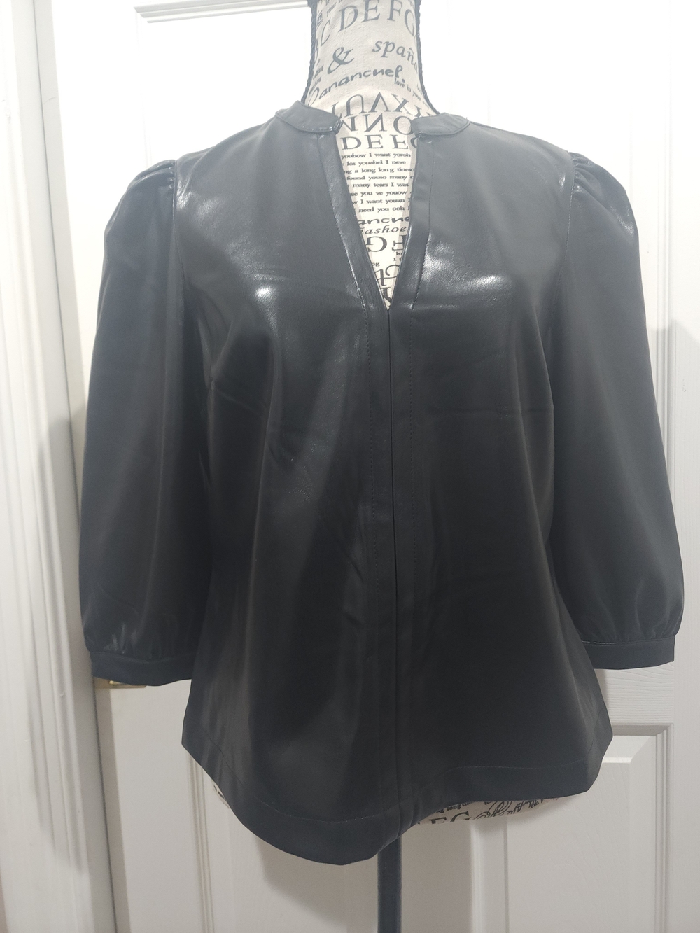 Women's Black Faux Leather Collarless Top